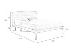 Letto imbottito in tessuto con struttura in legno di noce