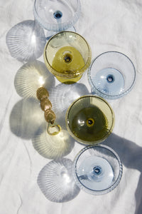 Apribottiglie a forma di conchiglia, modello Theo