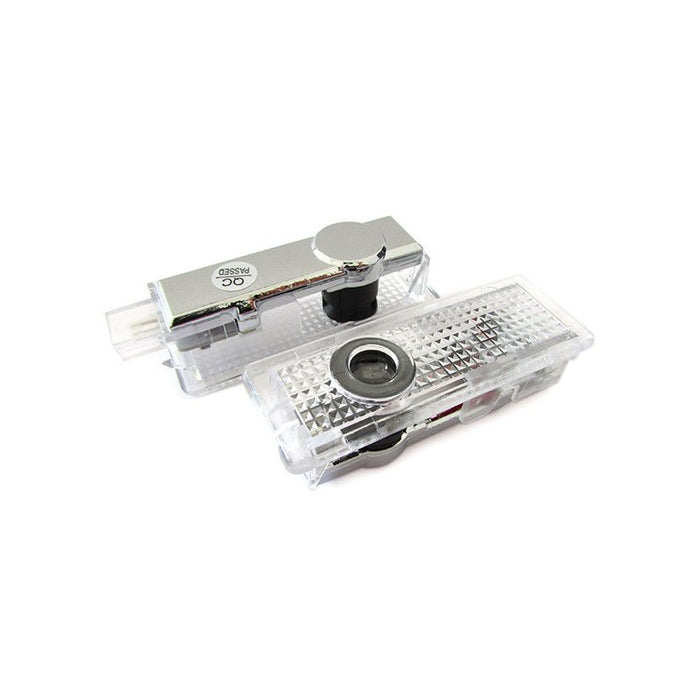 Kit Luci Led Logo Proiettori Auto Portiere BMW E60 E61 E63 E65 E66 E67 E68 E70 E71 E81 E83 E84 E85 E86 E87 E88 E90 E92 E93 F10 F01 F02
