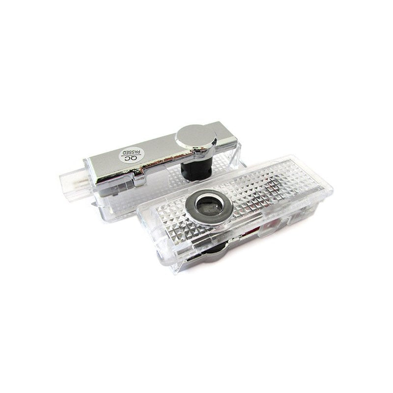 Kit Luci Led Logo Proiettori Auto Portiere BMW E60 E61 E63 E65 E66 E67 E68 E70 E71 E81 E83 E84 E85 E86 E87 E88 E90 E92 E93 F10 F01 F02