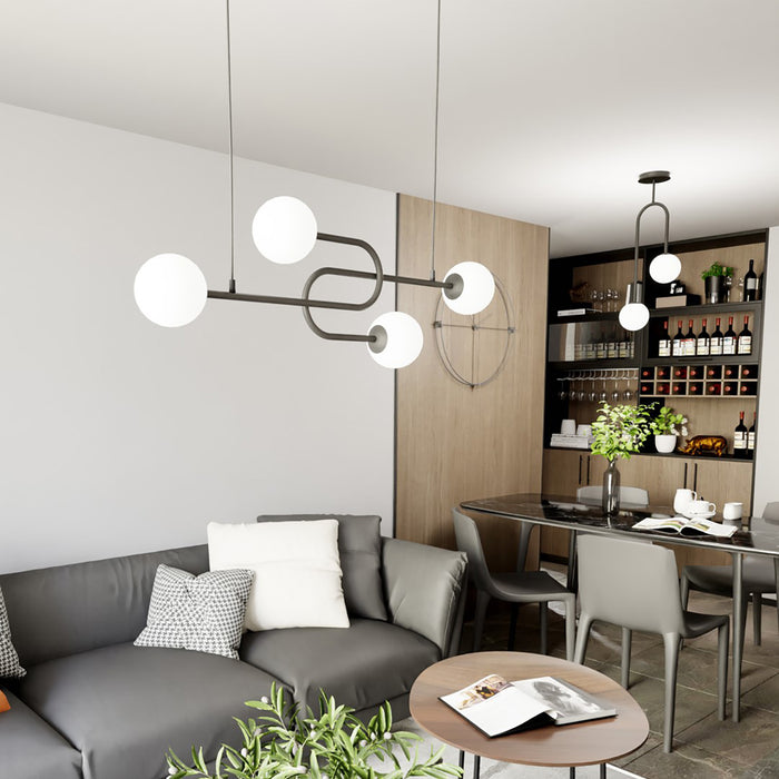 Lampadario 4 Luci Kine In Acciaio Nero E Sfere In Vetro Opale