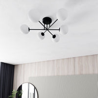 Plafoniera Moderna Morrigan 6 Luci In Acciao Nero E Sfere In Vetro Bianco