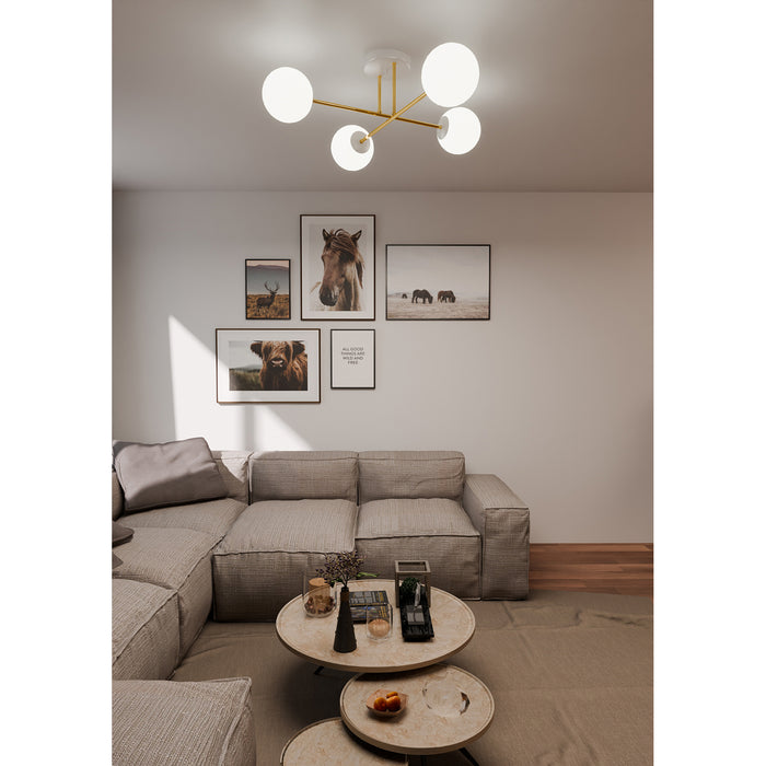 Plafoniera Moderna Magnium 4 Luci In Acciao Oro E Sfere In Vetro Bianco