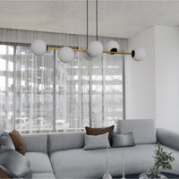 Sospensione Contemporanea Rhiannon 6 Luci In Acciaio Oro E Sfere In Vetro Bianco