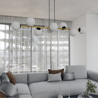 Sospensione Contemporanea Rhiannon 8 Luci In Acciaio Oro E Sfere In Vetro Bianco