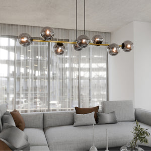 Sospensione Contemporanea Rhiannon 8 Luci In Acciaio Oro E Sfere In Vetro Fumè
