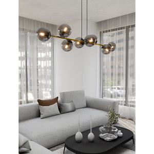 Sospensione Contemporanea Rhiannon 8 Luci In Acciaio Oro E Sfere In Vetro Fumè