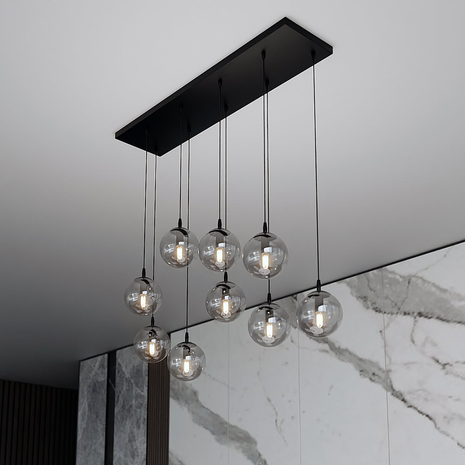 Sospensione Moderna 9 Luci Kali In Acciaio Nero E Sfere In Vetro Fumè