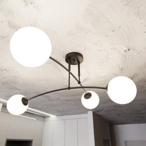 Plafoniera Moderna 4 Luci Susanoo In Acciaio Nero E Vetri A Sfera In Bianco