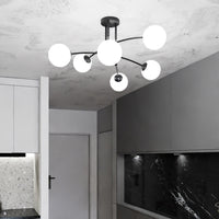 Plafoniera Moderna 6 Luci Susanoo In Acciaio Nero E Vetri A Sfera In Bianco