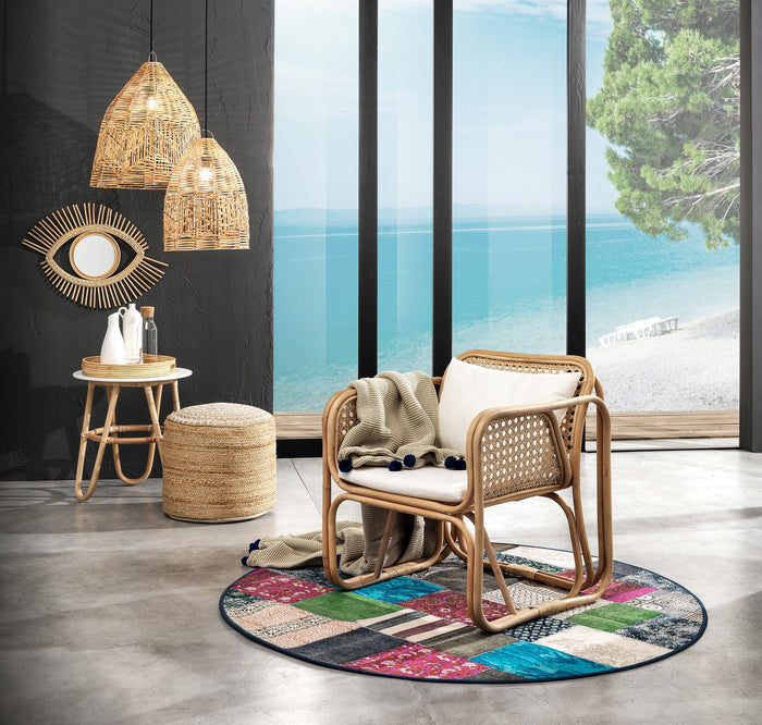 Poltroncina in rattan multicolore con cuscino per esterno