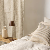 Lampada a led da tavolo Poldina Pro Corten ricaricabile e dimmerabile con batteria fino a 12 ore. Da uso esterno IP65