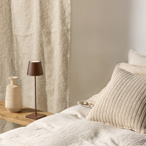 Lampada a led da tavolo Poldina Pro Corten ricaricabile e dimmerabile con batteria fino a 12 ore. Da uso esterno IP65