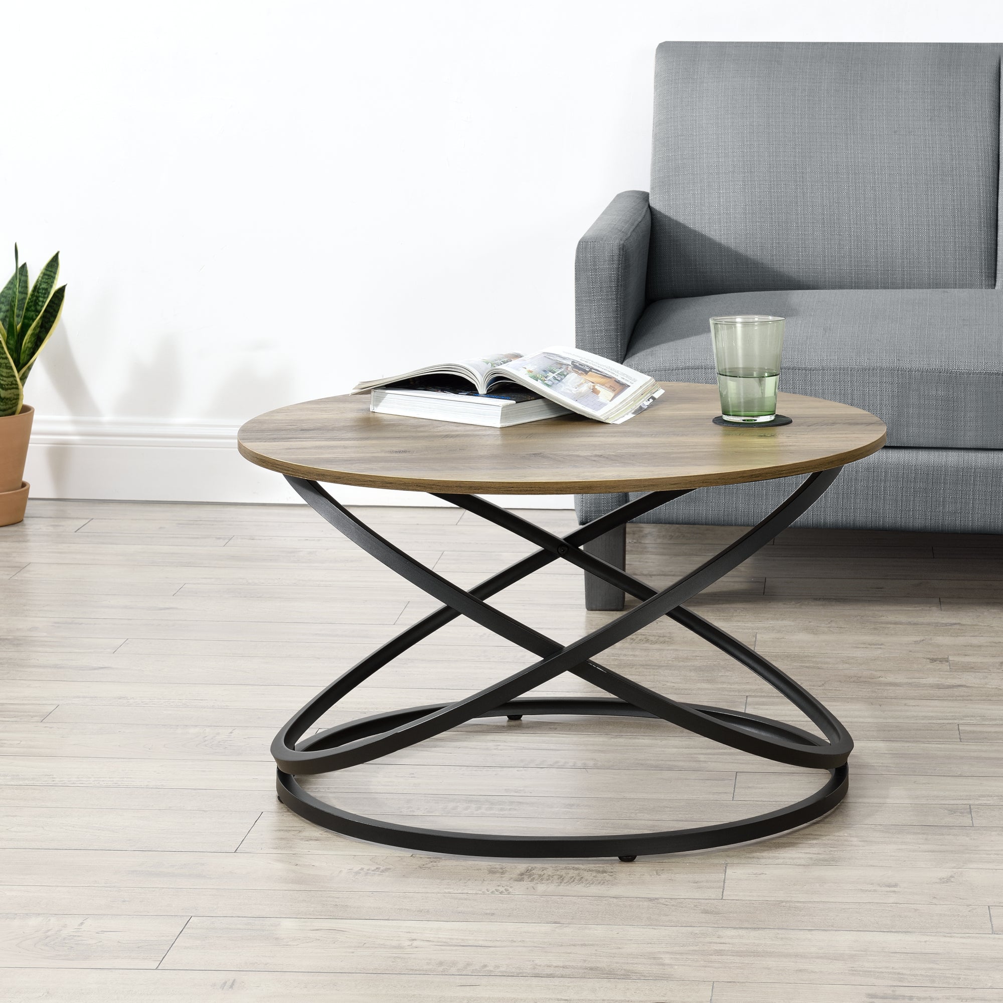Tavolino da Salotto Dunedin con Piano Rotondo e Base Spirale - Effetto Legno / Nero [en.casa]