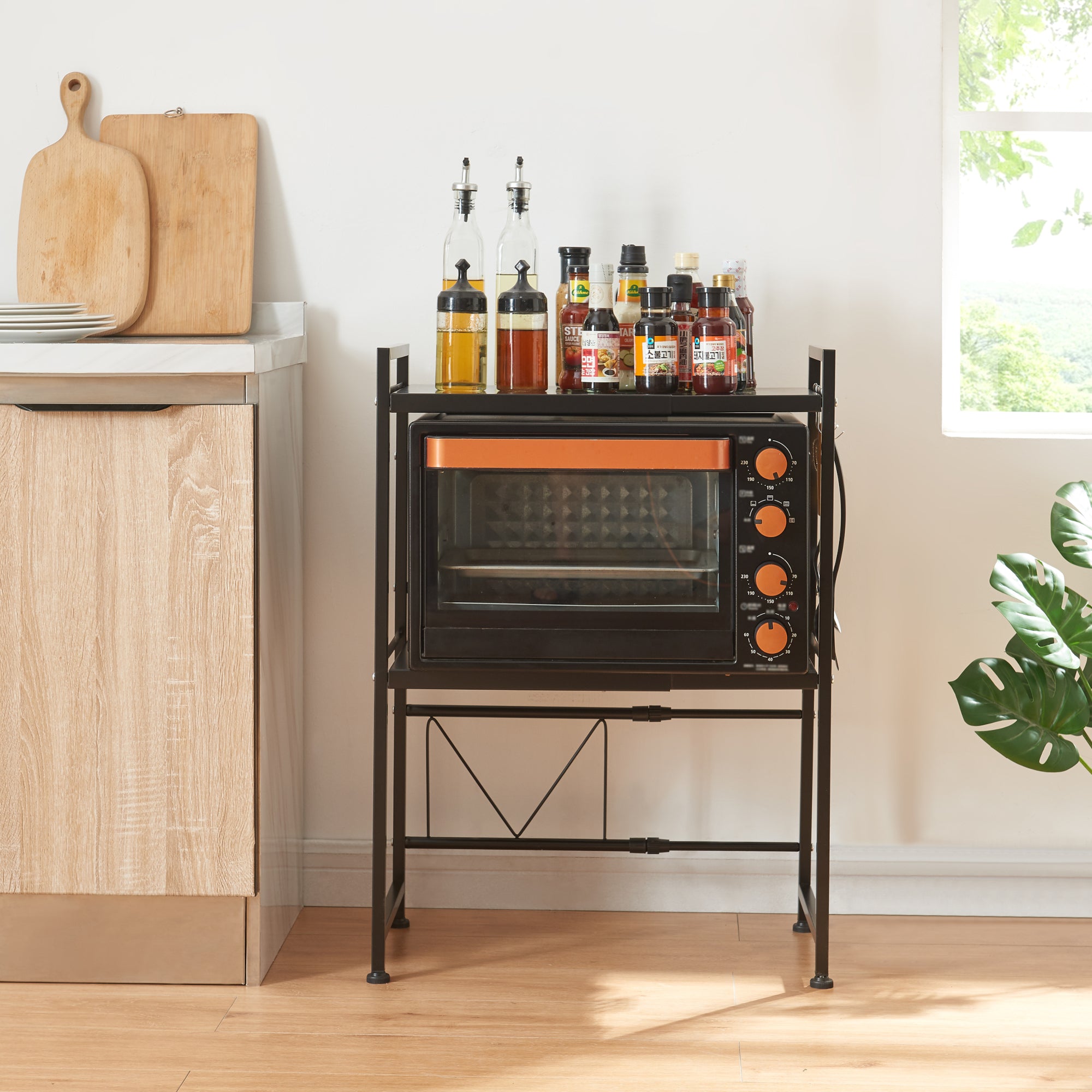 Scaffale per Microonde Sorsele Alto 79 cm Regolabile in Larghezza 40-63 cm Metallo Nero [en.casa]