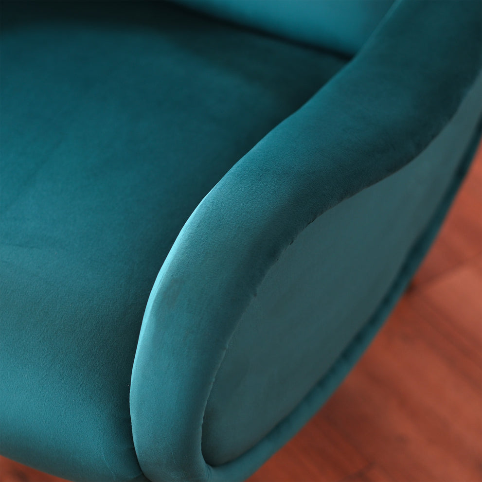 Poltrona Miss design vintage in velluto blu petrolio e gambe nere ottone