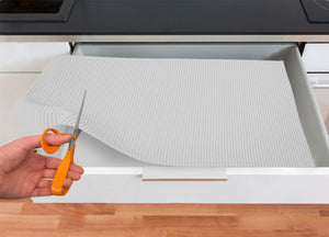 Tappetino Gommato Antiscivolo Multiuso Per Cassetti e Superfici Colore  Bianco - 65x500cm - Bianco