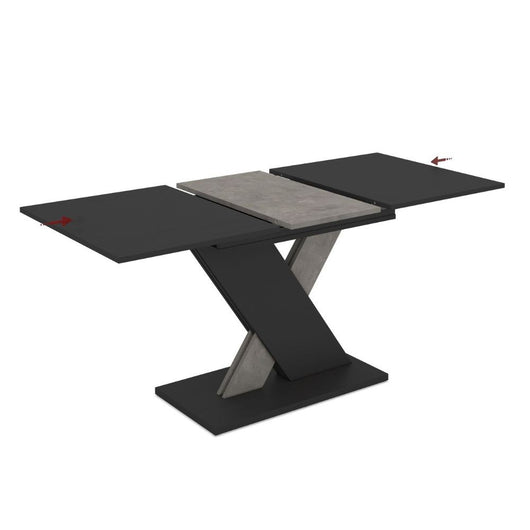 Tavolo allungabile Axi in colore nero con dettaglio gamba e allunga in cemento
