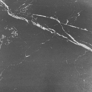 Tavolo allungabile Kyoto con piano in ceramica effetto marmo nero ardesia opaco e struttura in metallo nero