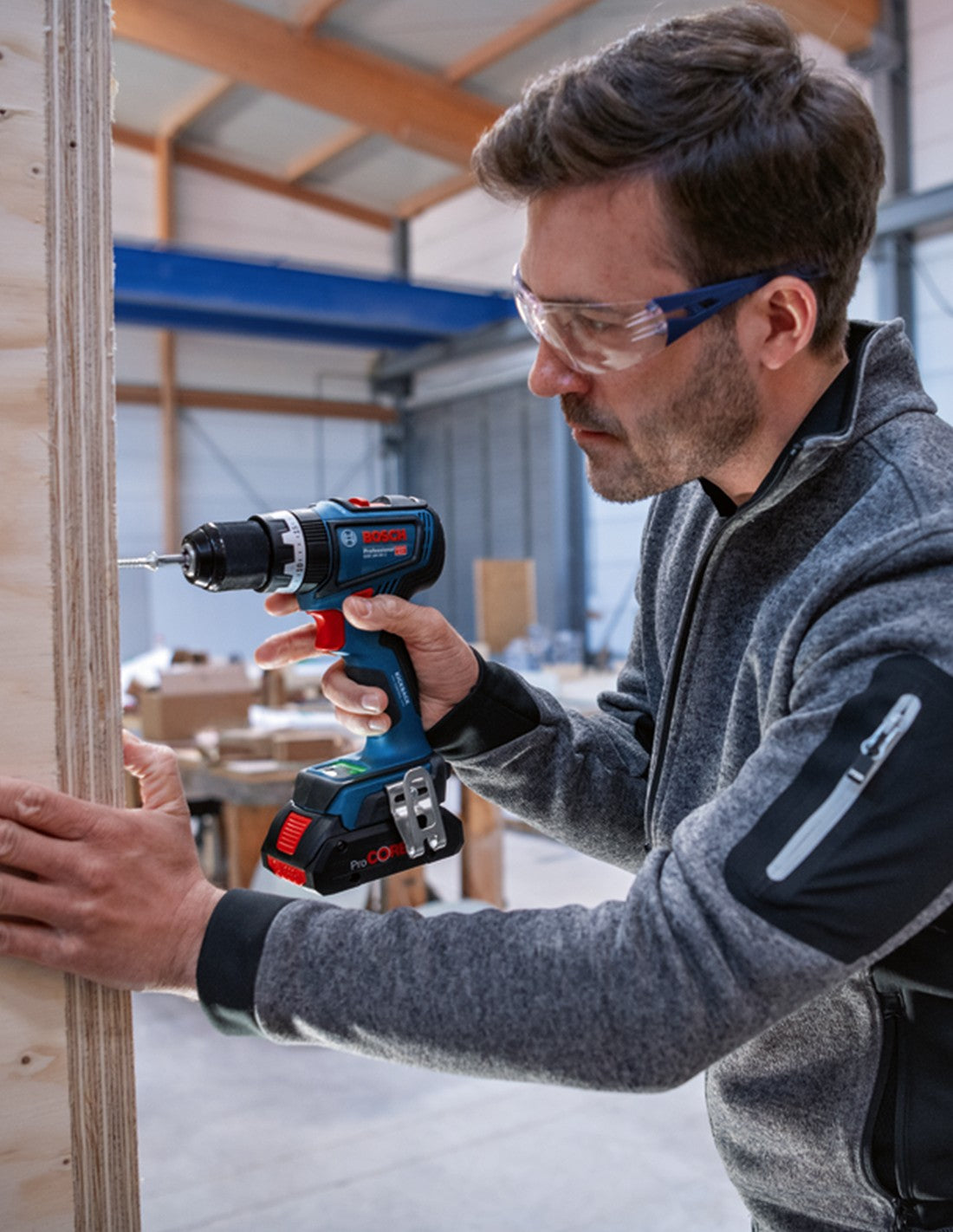 Trapano a Percussione BOSCH GSB 18V-90 C (2 x 4,0 Ah + GAL18V-40 + L-Boxx 136)