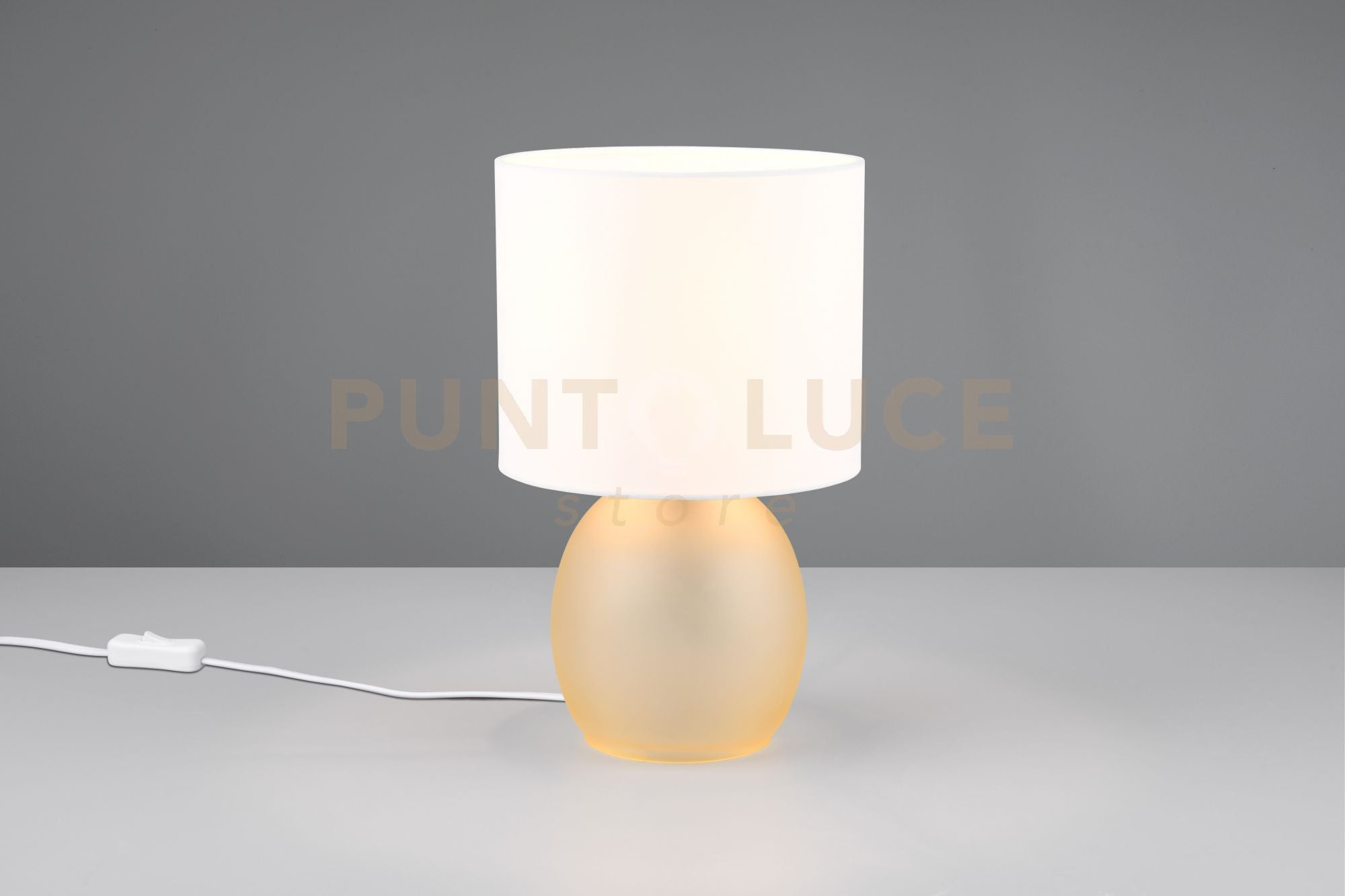 VELA LAMPADA DA TAVOLO BASE VETRO AMBRA CON PARALUME BIANCO H. 29CM 1 LUCE ATTACCO E14