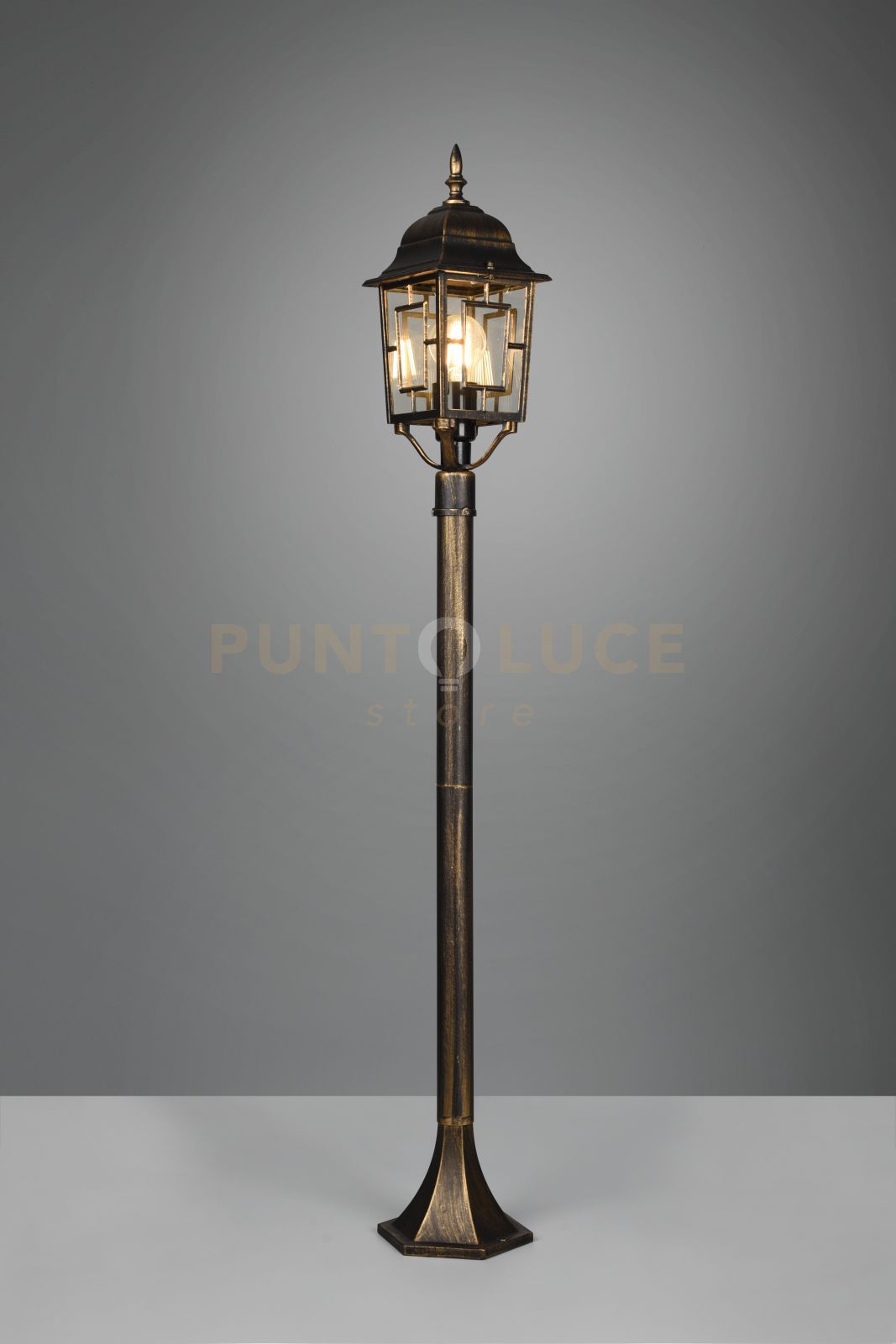 VOLTURNO PALO DA ESTERNO 4 LATI FUSIONE DI ALLUMINIO RUGGINE CON DECORO IN FUSIONE SUL VETRO E VETRO TRASPARENTE H. 100CM IP44 1 LUCE ATTACCO E27