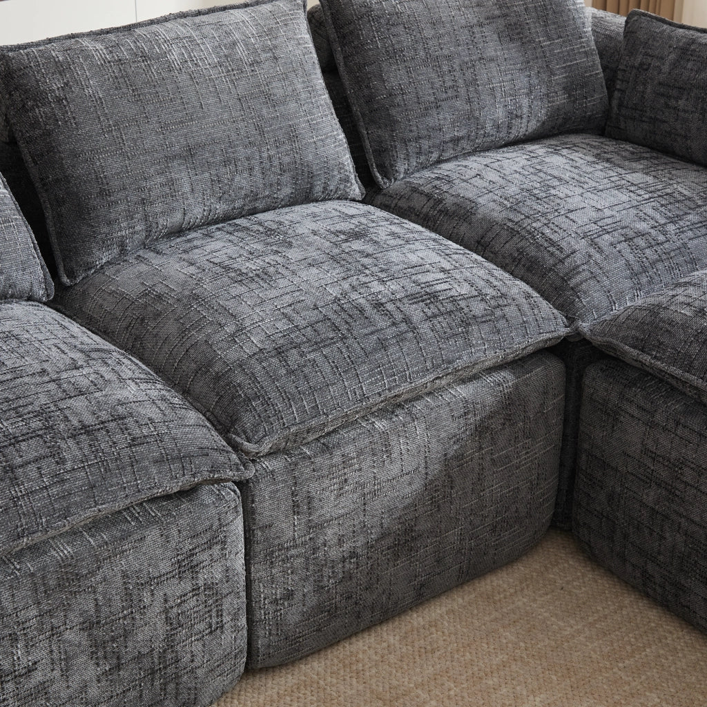 Divano modulare 3 posti in ciniglia grigio con pouf e cuscini; 256x161x75 cm