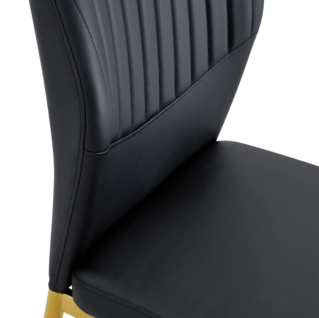 Set di 4 sedie da pranzo nere e oro in PU con gambe in metallo