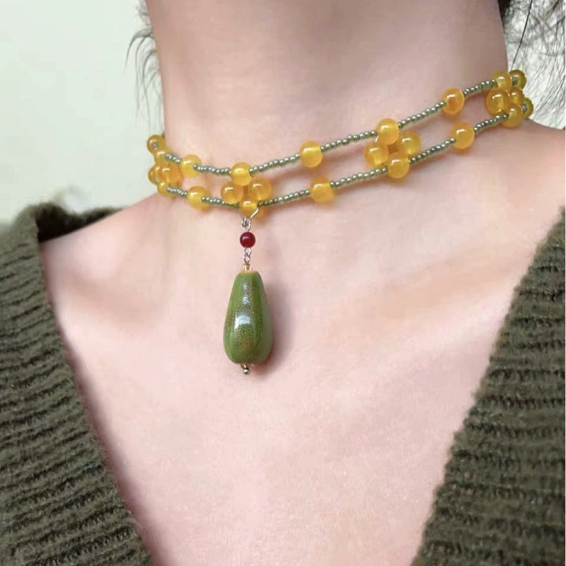 Collana vintage con perline a goccia in ceramica verde