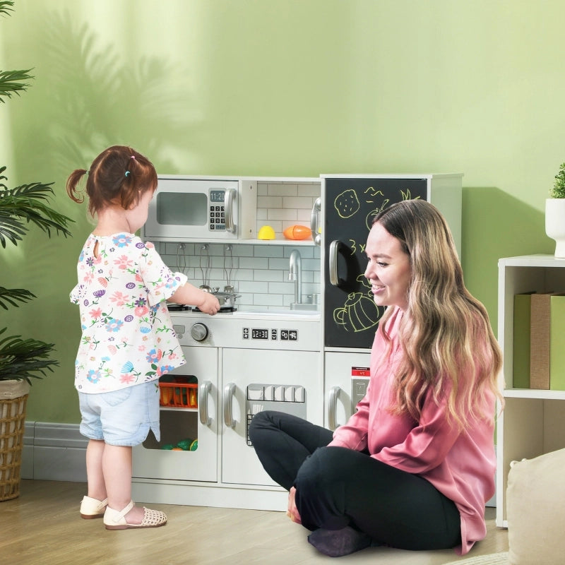 Cucina giocattolo per bambini in legno con lavello, microonde, piano cottura, lavagna e accessori, bianca
