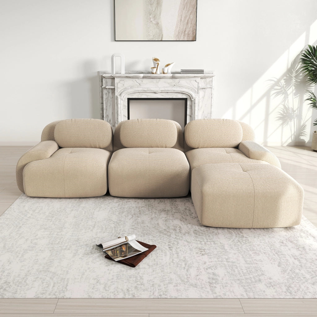 divano angolare modulare senza montaggio; design ergonomico; braccioli larghi; in velluto a coste beige