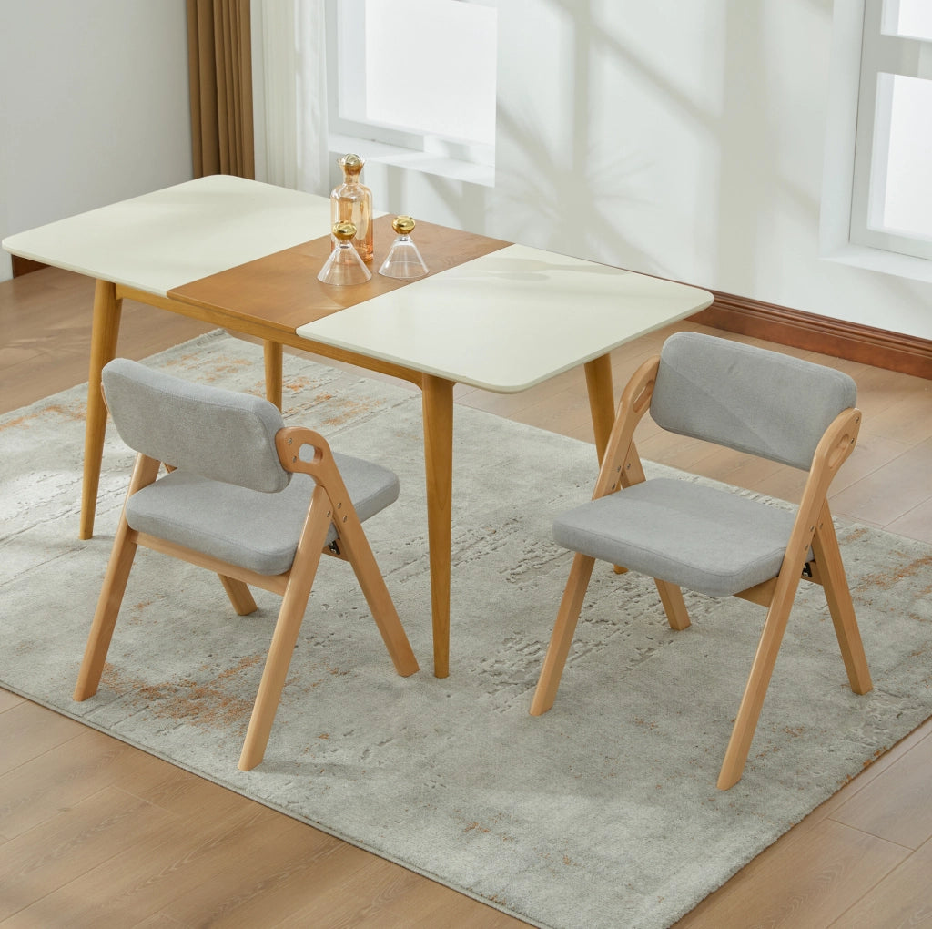Sedia pieghevole con seduta imbottita in legno grigio