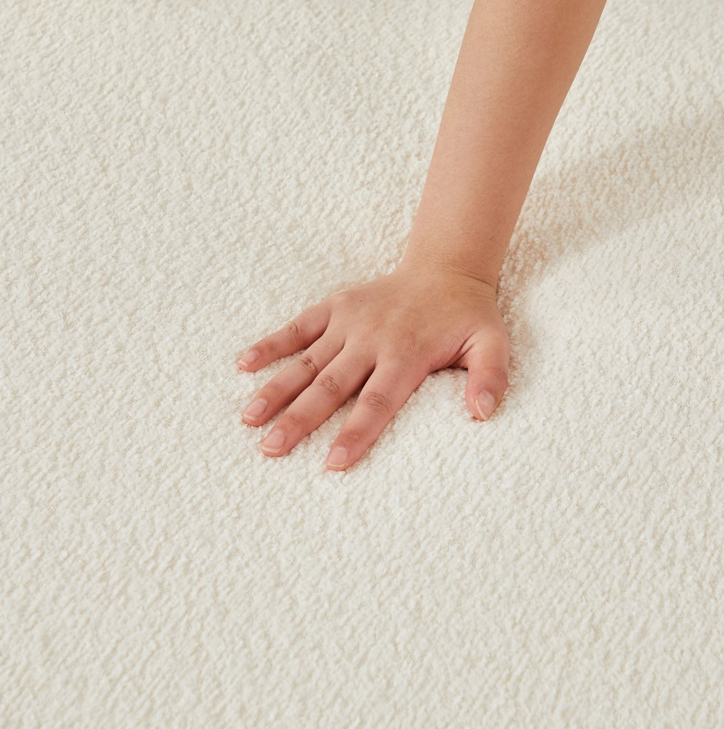 Poltrona relax in ciniglia con schienale ondulato, colore beige