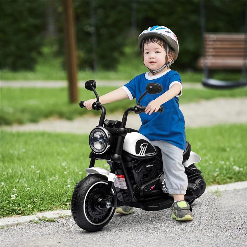 MOTO ELETTRICA PER BAMBINI 18-36 MESI CON ROTELLE E FANALE, 76X42X57 CM, BIANCO E NERO