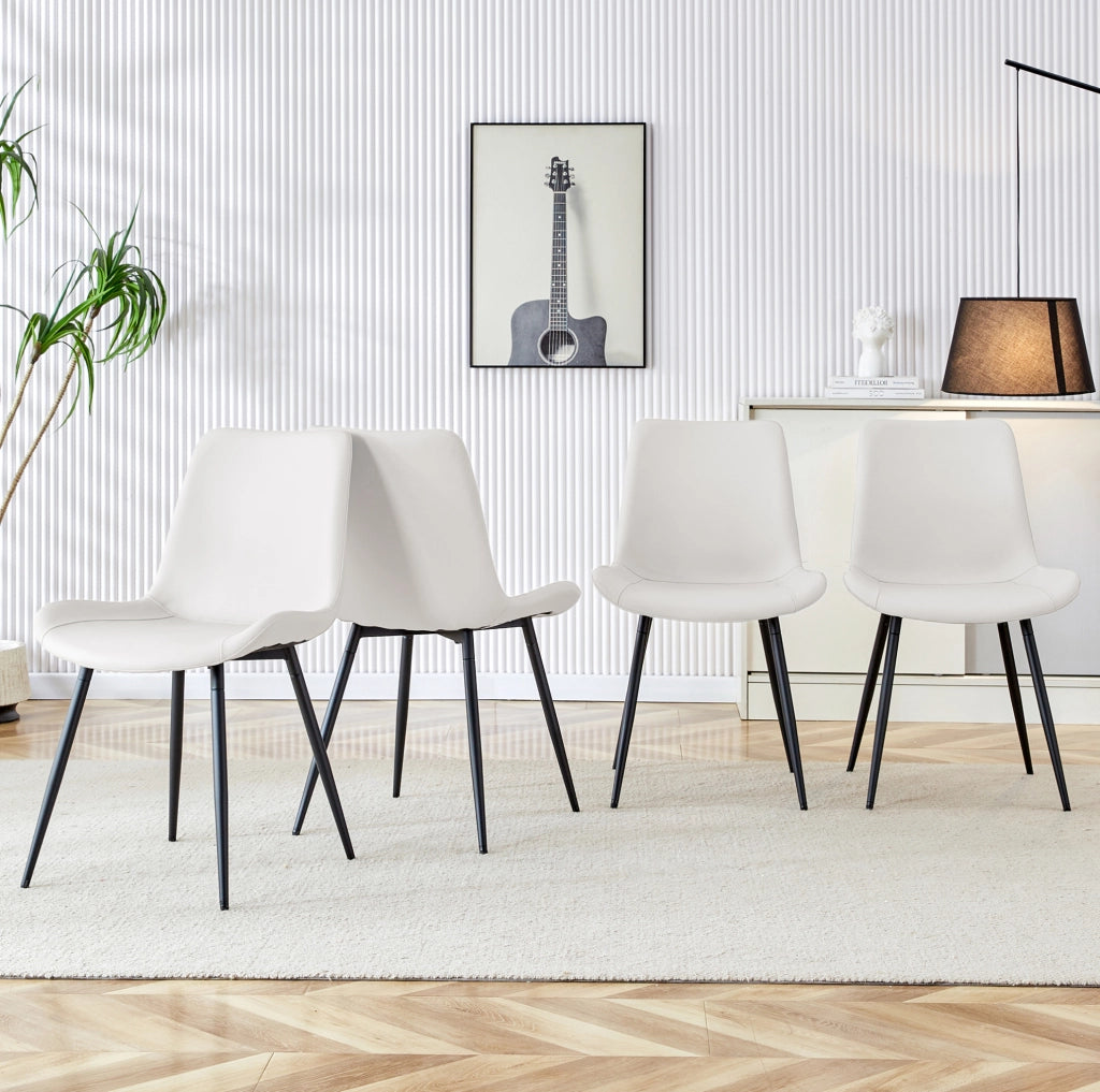 Set di 4 sedie da pranzo in similpelle bianca con struttura in metallo nero; design ergonomico
