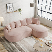 Divano modulare a L senza struttura in ciniglia con chaise longue profonda braccioli larghi e cuscini rosa