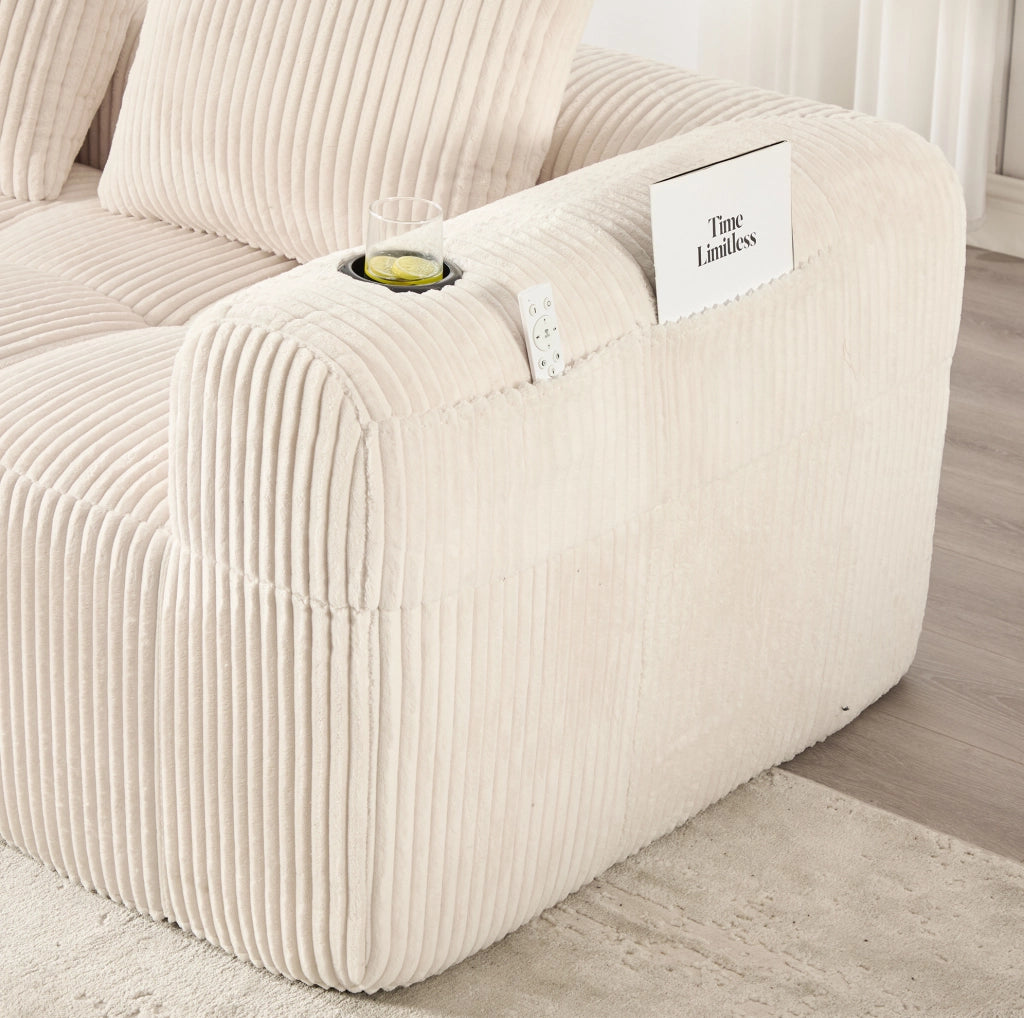 Sofa modulare 253x158x61 cm con sistema DIY; tasche laterali e portabevande in cord beige
