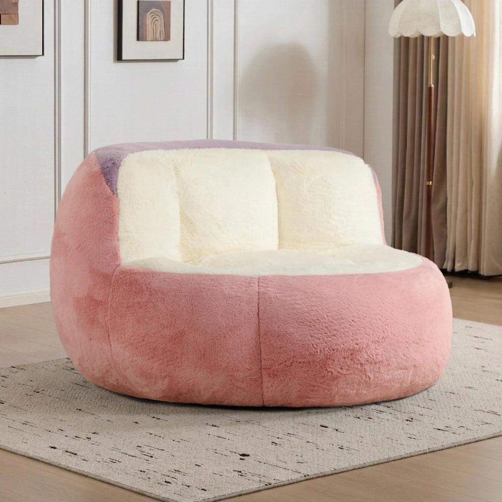 Poltrona pouf con imbottitura in schiuma sminuzzata, maniglia e base antiscivolo, in pelliccia sintetica multicolore