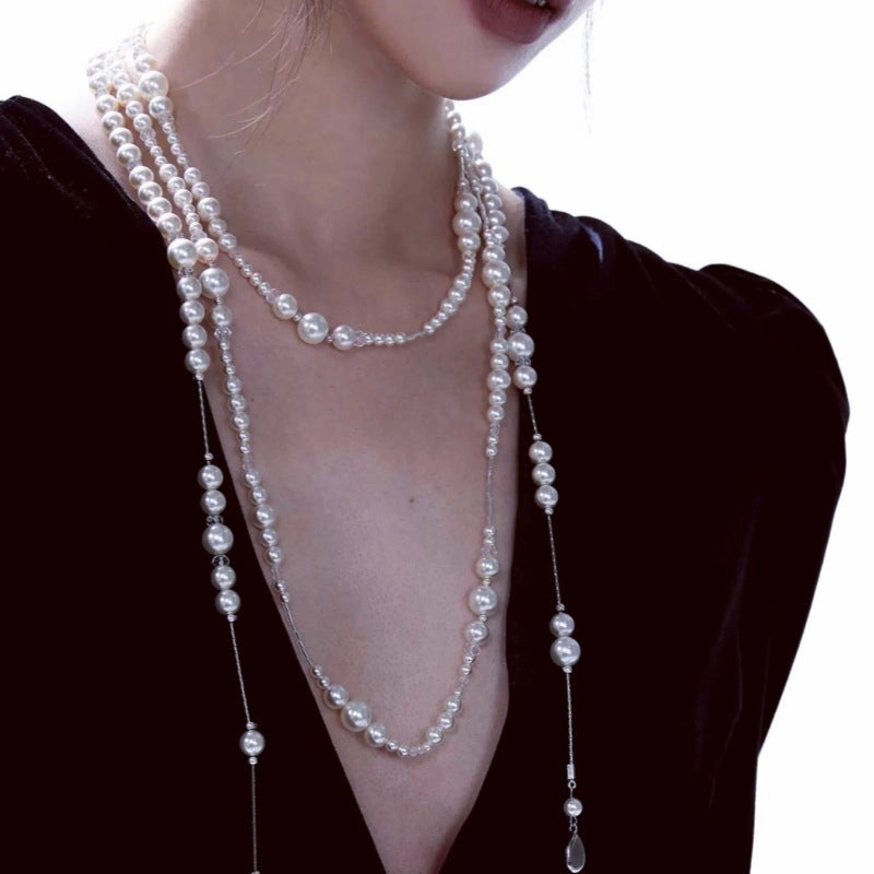 Collana retr¨° ed elegante con nappe di perle a pi¨´ strati, girocollo lungo con cristalli sovrapposti, catena a maglia retr¨° con motivo cielo stellato a goccia