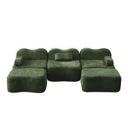Divano angolare modulare 3 posti con pouf; seduta profonda; velluto verde