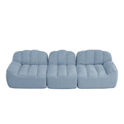 Divano modulare con seduta profonda e forma ergonomica in pile granulato blu