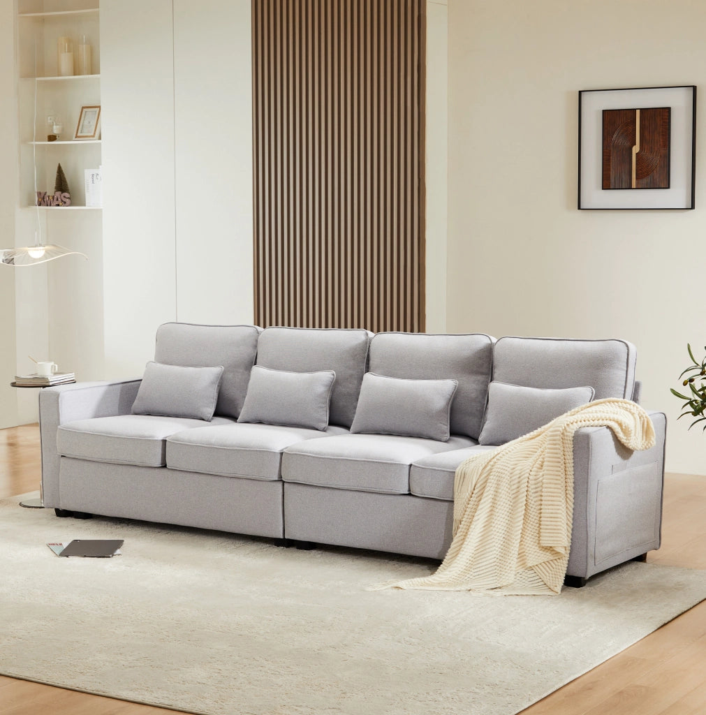 Divano a 4 posti grigio effetto lino; con tasche sui braccioli e 4 cuscini; 264 cm