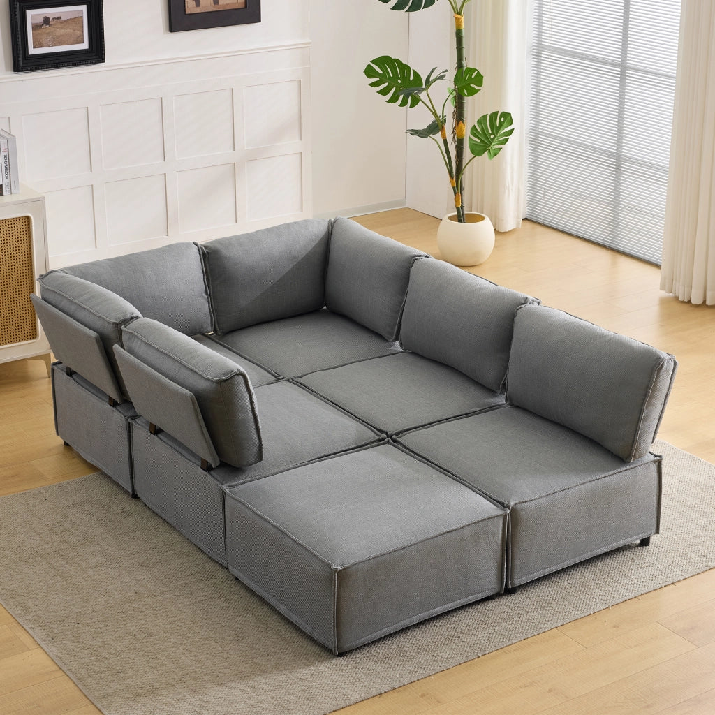 Divano modulare con funzione letto e seduta confortevole in tessuto grigio chiaro 308 × 152 × 77 cm