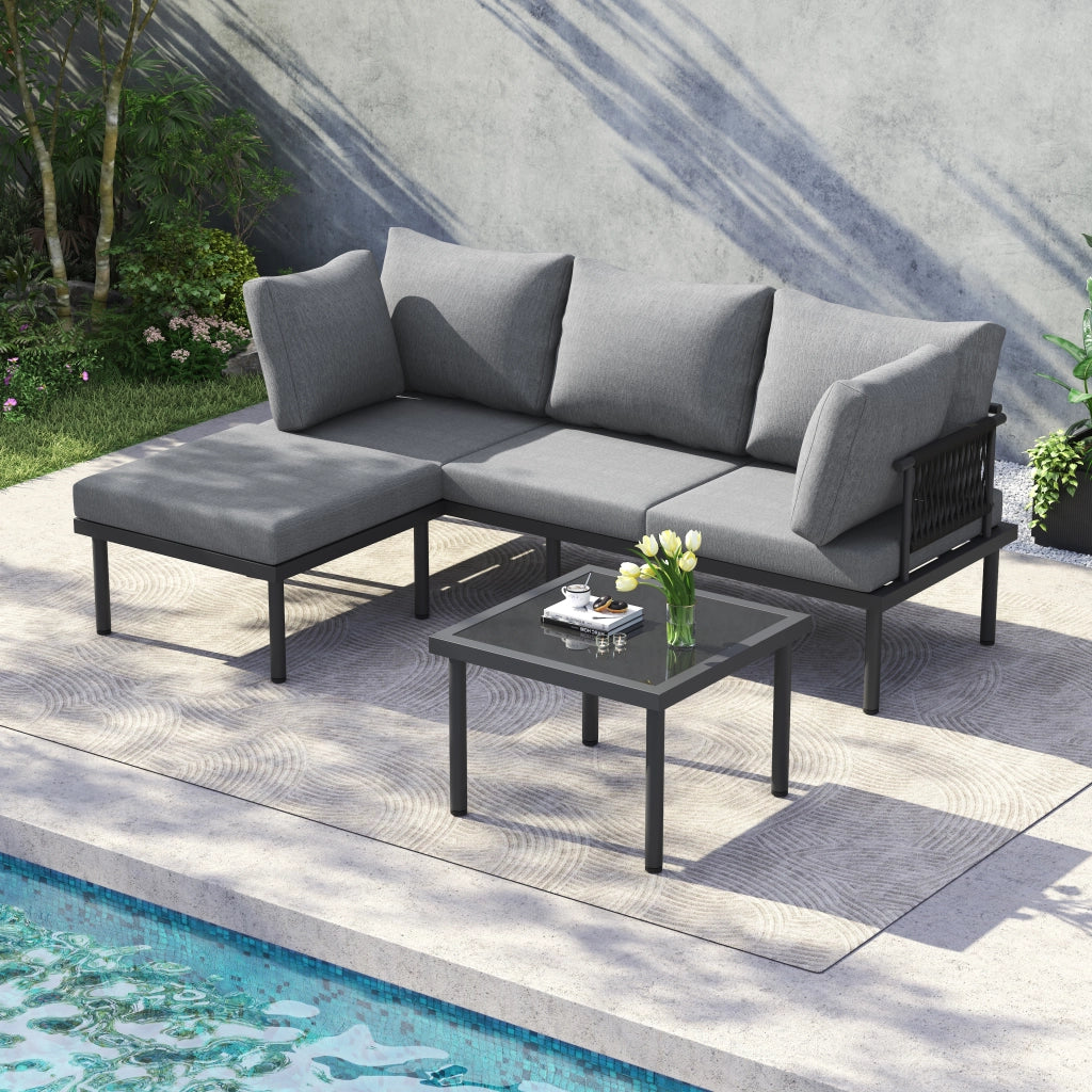 Set Divano da Giardino con Tavolino e Pouf ¨C MINIMAL ¨C Polyrattan, Acciaio, Vetro, Grigio/Nero
