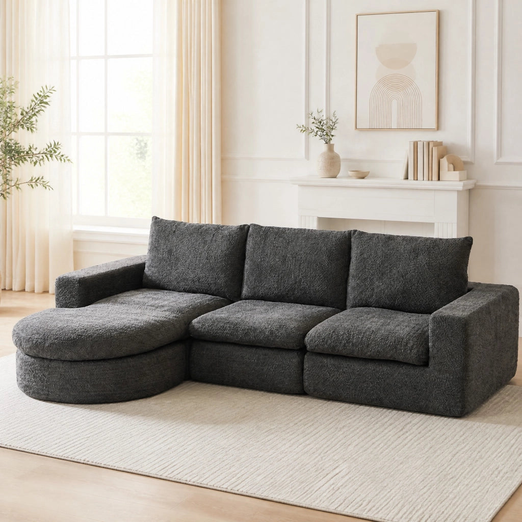 Divano modulare in ciniglia grigio con chaise longue reversibile e tre cuscini