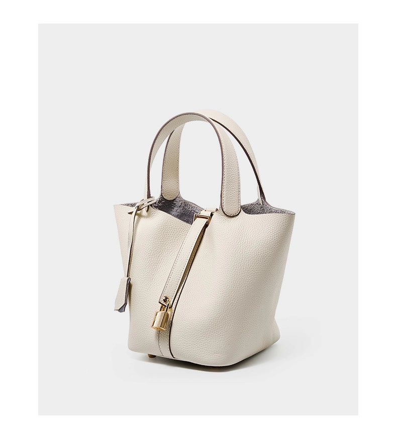 Borsa a mano da donna in vera pelle, a tracolla, modello tote bag, colore bianco.