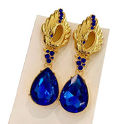 Orecchini a lobo a goccia con diamanti blu, dallo stile retr¨°-chic, sofisticati e lussuosi.