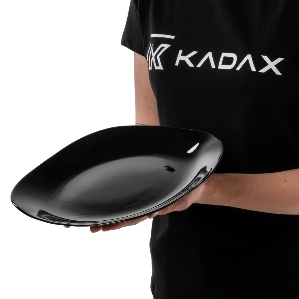Set di 3 piatti piani KADAX da 28 cm, colore nero.