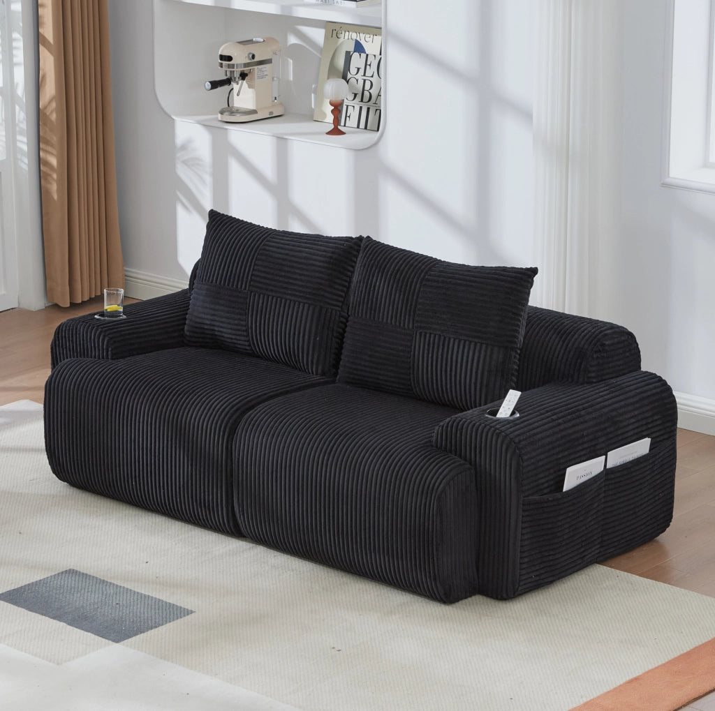 Divano modulare a 2 posti in tessuto corduroy nero; con portabicchiere e tasca laterale; 200 cm