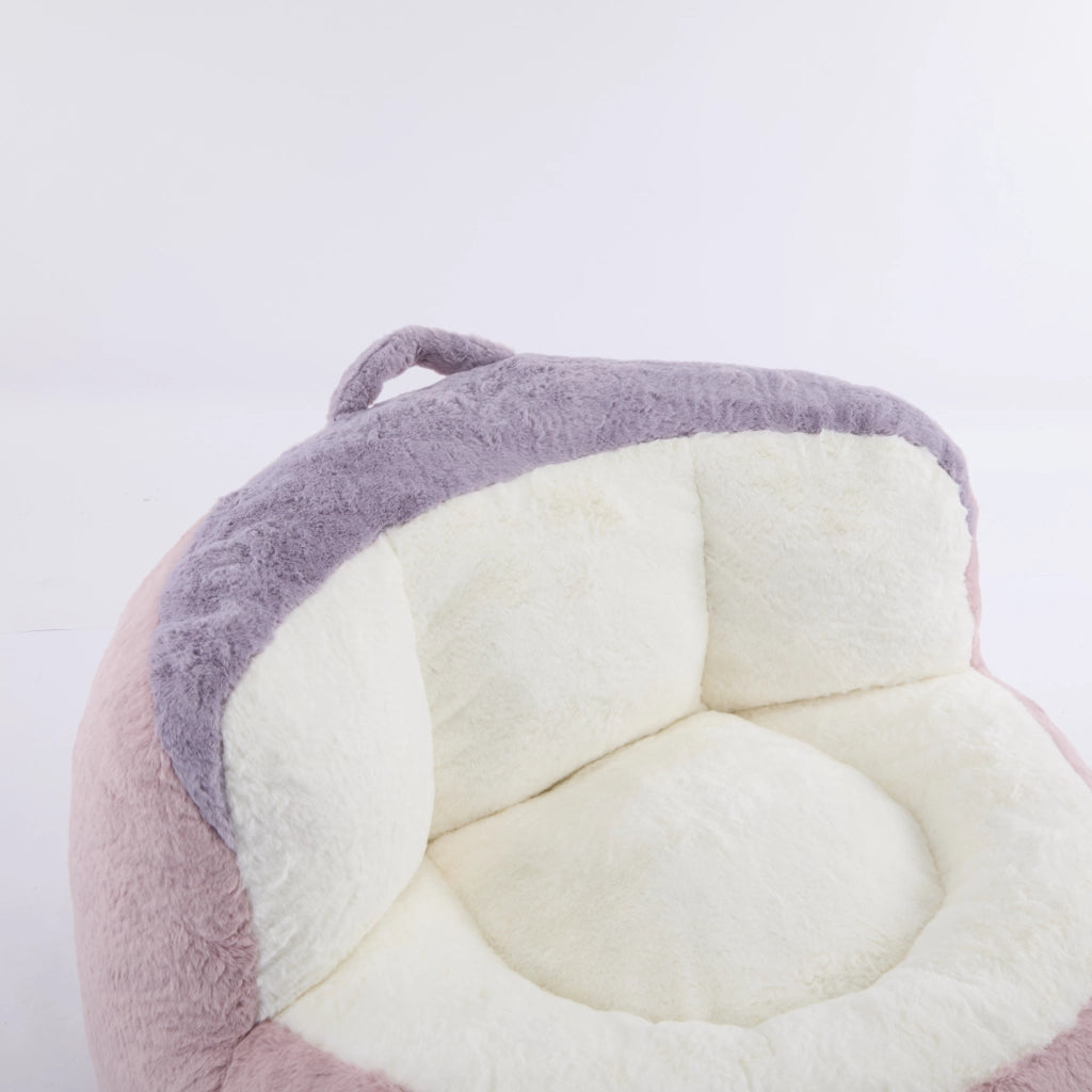Poltrona pouf con imbottitura in schiuma sminuzzata, maniglia e base antiscivolo, in pelliccia sintetica multicolore